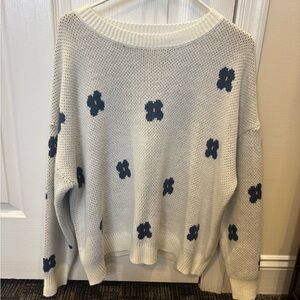 White sweater with flowers